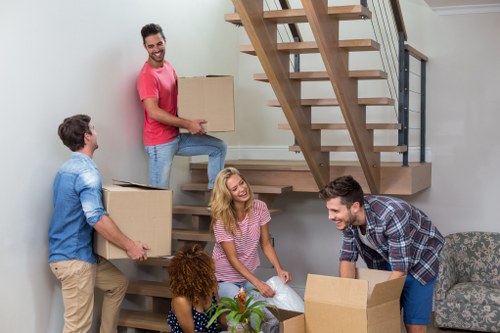 Professional removals planning in Surrey Quays with boxes and moving van