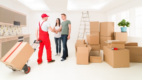 Packing boxes for a home move in Surrey Quays
