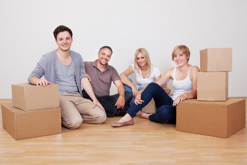 Professional movers handling furniture in Surrey Quays